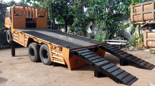 Harga  Karoseri truk self loader  di Kepulauan Bangka Belitung 