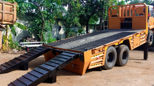 Harga  Karoseri truk self loader  di Mojokerto 