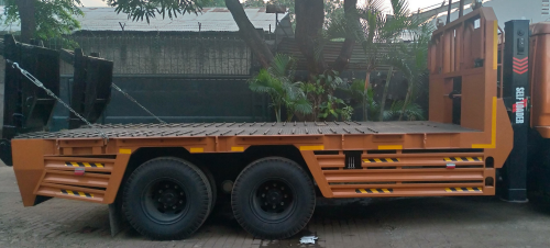 Harga  Karoseri truk self loader  di Riau 